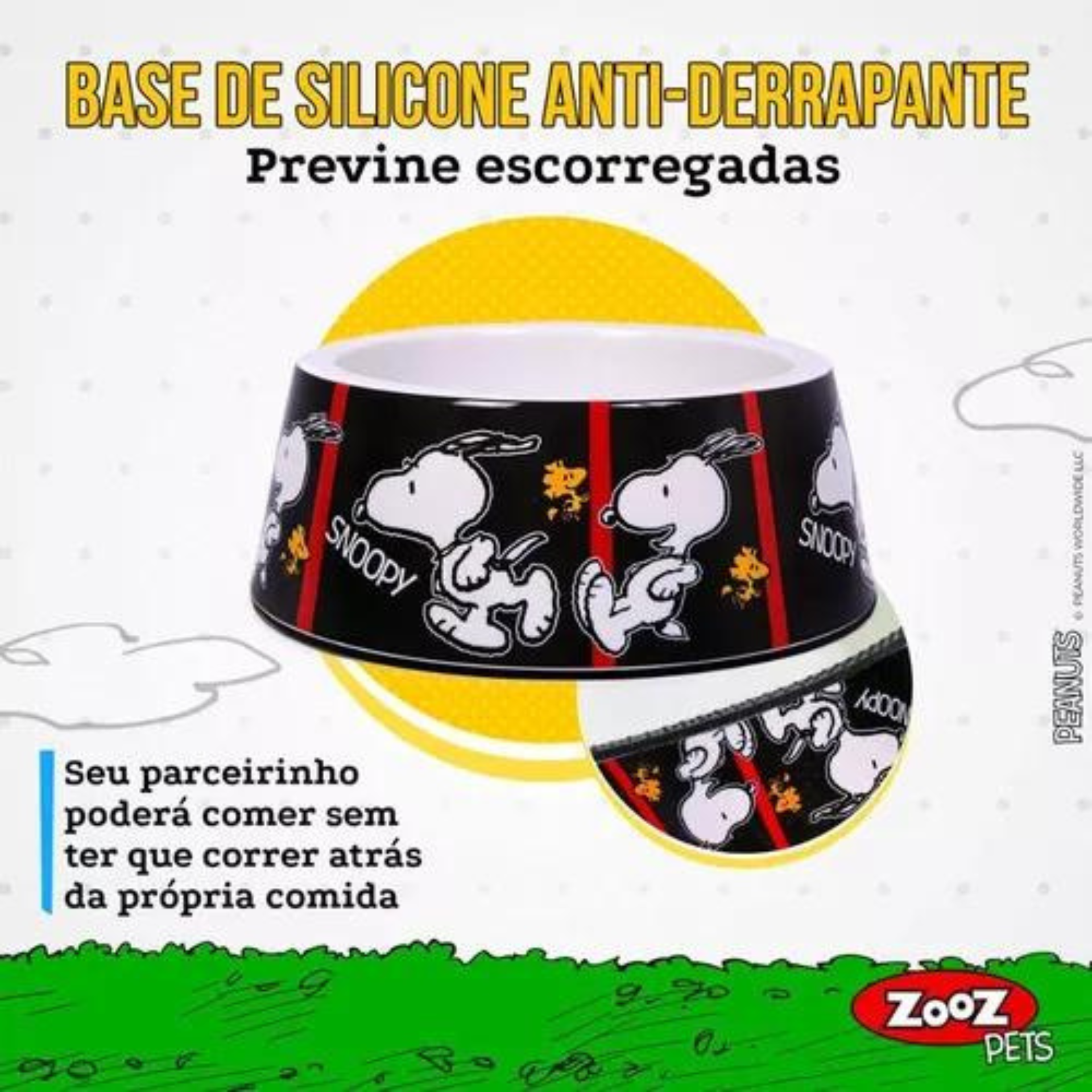 Informações sobre o comedouro ZOOZ para animal, em plástico, com design do Snoopy, preto e branco com detalhes vermelho. Vista frontal sobre fundo branco.