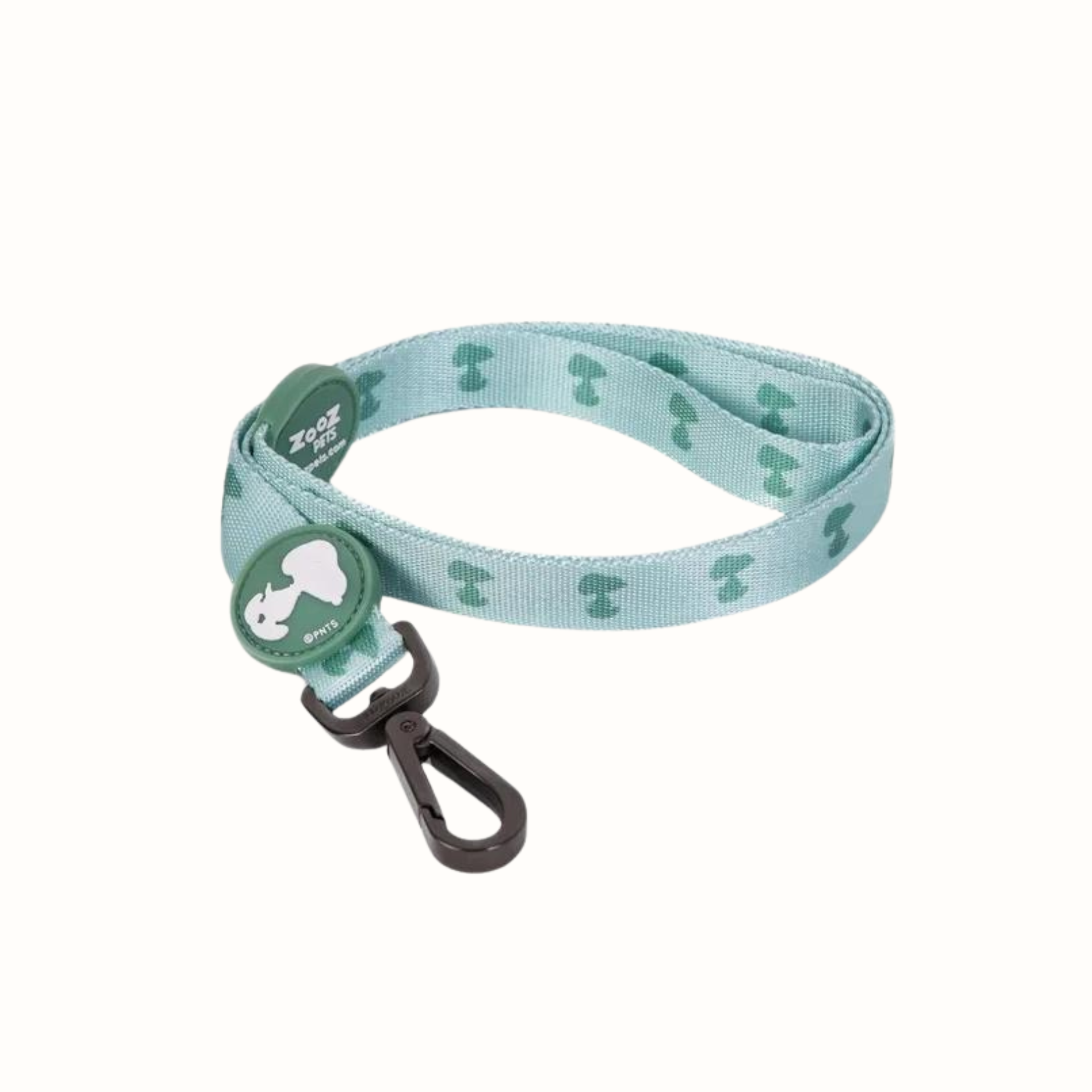 Trela Zooz, em padrão azul claro e verde claro e figuras do snoopy. Vista de frente, sobre fundo branco.