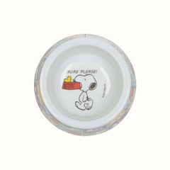 Comedouro ZOOZ para animal, com design do Snoopy, featuring ilustrações coloridas do personagem. Material de plástico. Vista de cima, sobre fundo branco. 
