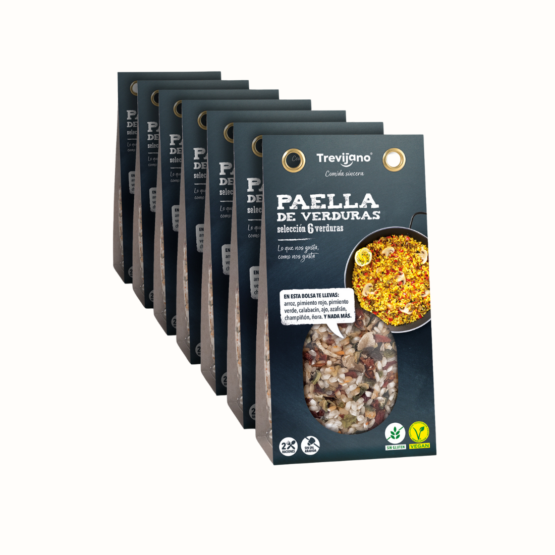 Paella 6 Verduras Trevijano em embalagem de cartão e plástico transparente, com uma mistura de vegetais desidratados, incluindo açafrão e pimentão. A embalagem tem um rótulo com o nome do produto e informações nutricionais. Fundo branco
